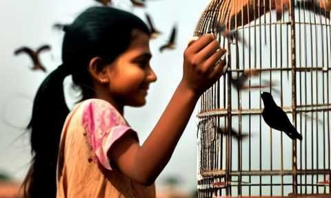 girl and caged bird